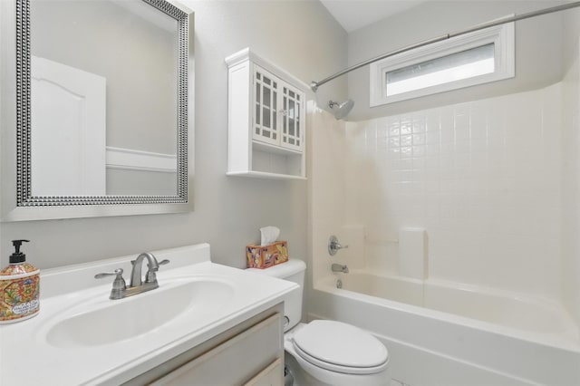bathroom with toilet, vanity, and shower / bathtub combination