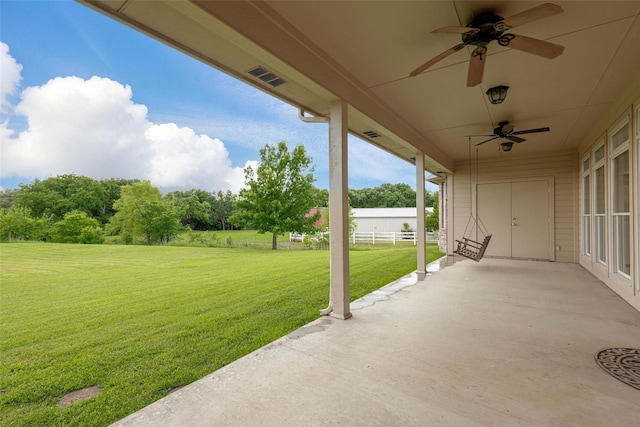 view of patio featuring a ceiling fan