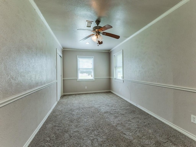 13134 Ravenview Rd, Dallas, TX 75253 - spare room with crown molding, a textured wall, ceiling fan, carpet floors, and baseboards