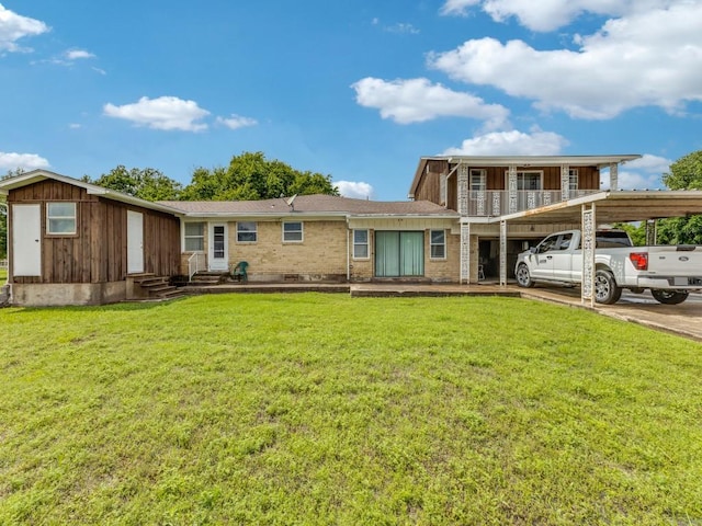 13134 Ravenview Rd, Dallas, TX 75253 - rear view of property with entry steps, a yard, and brick siding