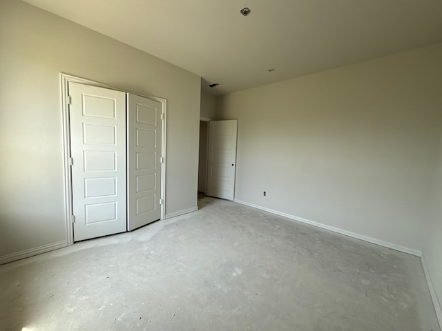 400 Tollett Dr, Aledo, TX 76008 - unfurnished bedroom featuring concrete floors and baseboards