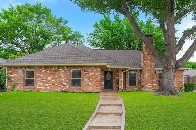 3809 Runge Ct E, Irving, TX 75038 - single story home with roof with shingles, a chimney, a front yard, and brick siding