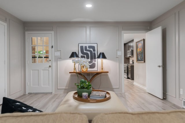 3809 Runge Ct E, Irving, TX 75038 - entryway with wood finished floors and a decorative wall