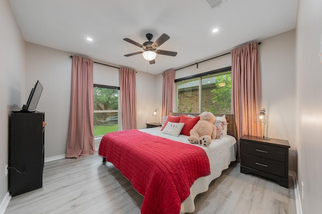 3809 Runge Ct E, Irving, TX 75038 - bedroom featuring light wood-type flooring, baseboards, recessed lighting, and ceiling fan