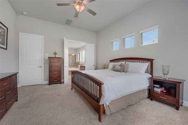4458 Hartebeest Trl, Frisco, TX 75034 - bedroom with light colored carpet, connected bathroom, a ceiling fan, and baseboards