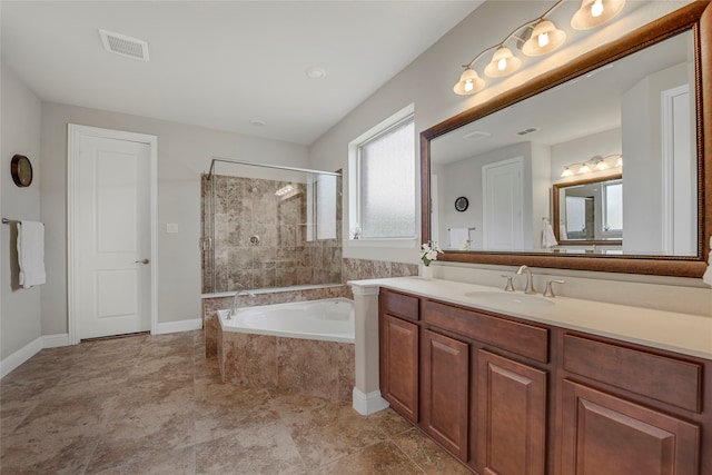 4458 Hartebeest Trl, Frisco, TX 75034 - full bathroom featuring a relaxing tiled tub, tiled shower, vanity, and baseboards