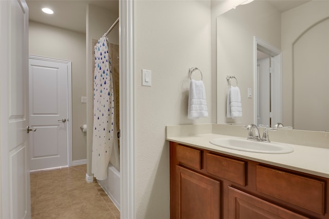 4458 Hartebeest Trl, Frisco, TX 75034 - full bathroom featuring tile patterned floors, vanity, and shower / bathtub combination with curtain