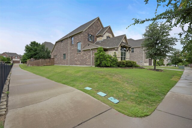 4458 Hartebeest Trl, Frisco, TX 75034 - view of property exterior featuring brick siding