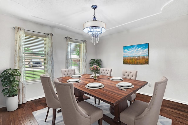 5504 Shady Meadow St, North Richland Hills, TX 76180 - dining area with a chandelier, baseboards, and wood finished floors