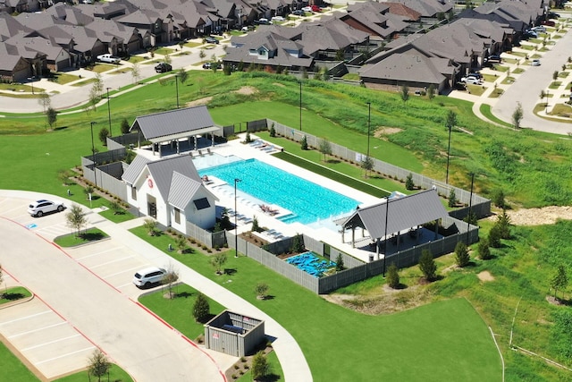 aerial view of residential area featuring a pool area