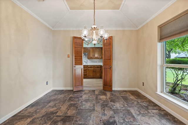 unfurnished dining area featuring a chandelier, baseboards, vaulted ceiling, dark stone finish flooring, and ornamental molding
