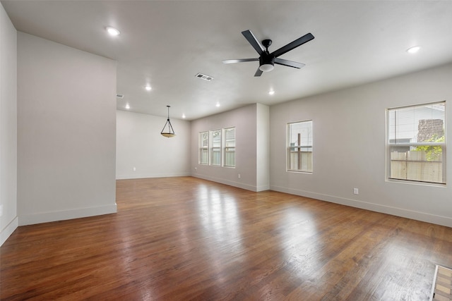 2735 S Jennings Ave, Fort Worth, TX 76110 - spare room featuring baseboards, recessed lighting, wood finished floors, and ceiling fan