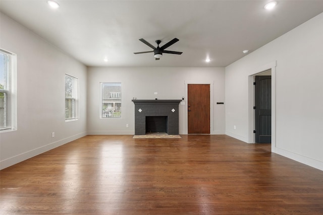 2735 S Jennings Ave, Fort Worth, TX 76110 - unfurnished living room with healthy amount of natural light, a ceiling fan, wood finished floors, a fireplace, and recessed lighting