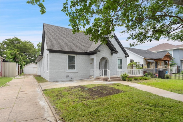 2735 S Jennings Ave, Fort Worth, TX 76110 - view of front facade with brick siding, a shingled roof, and a garage