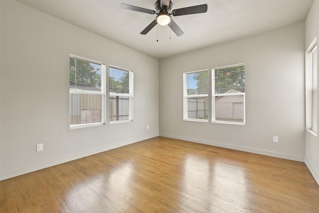 2735 S Jennings Ave, Fort Worth, TX 76110 - spare room featuring plenty of natural light, baseboards, and a ceiling fan