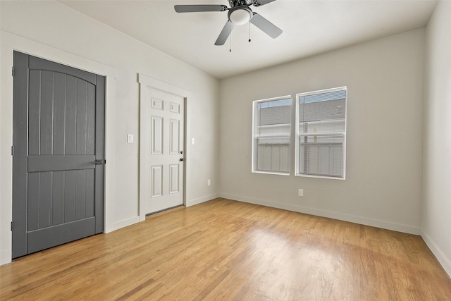 2735 S Jennings Ave, Fort Worth, TX 76110 - unfurnished bedroom featuring light wood-style flooring, baseboards, and a ceiling fan