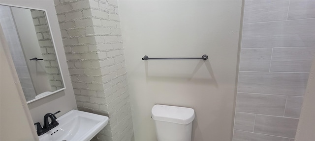 bathroom with a sink and toilet