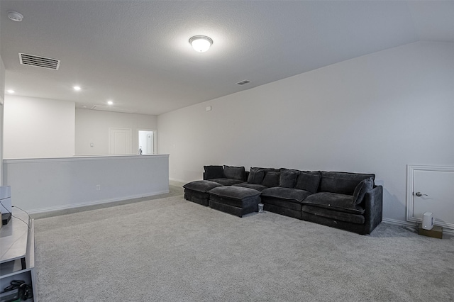 carpeted living room with baseboards and recessed lighting