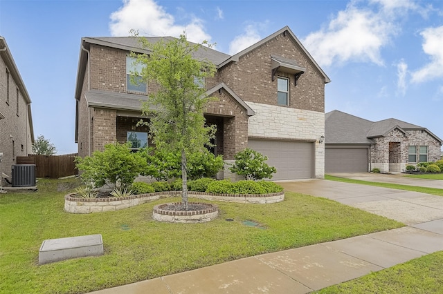 traditional home featuring brick siding, driveway, an attached garage, and central air condition unit