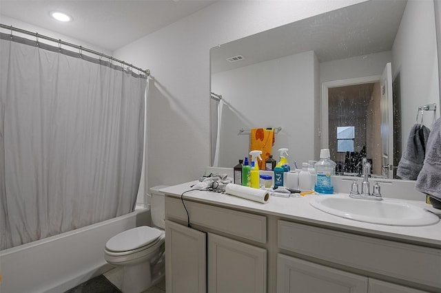 bathroom with vanity, toilet, shower / bathtub combination with curtain, and recessed lighting