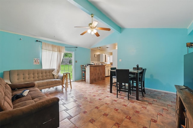 living area with ceiling fan and light stone finish floors
