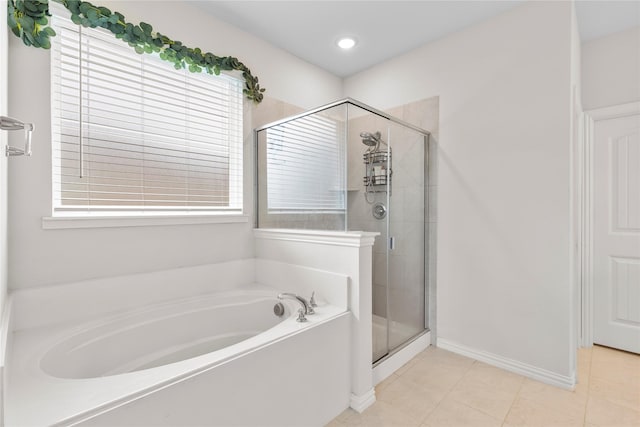 804 Feather Edge Dr, Springtown, TX 76082 - bathroom with a bath, a stall shower, tile patterned floors, and baseboards