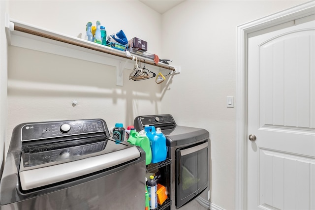 804 Feather Edge Dr, Springtown, TX 76082 - laundry room featuring separate washer and dryer
