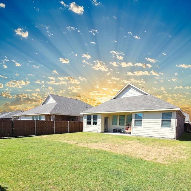 3405 Western Trl, Crandall, TX 75114 - back of property at dusk with a patio