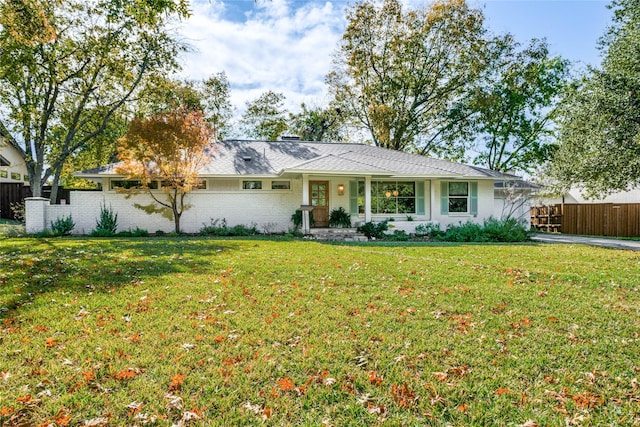 single story home with brick siding