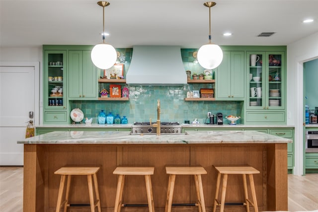 bar featuring custom range hood, decorative backsplash, light wood finished floors, pendant lighting, and recessed lighting