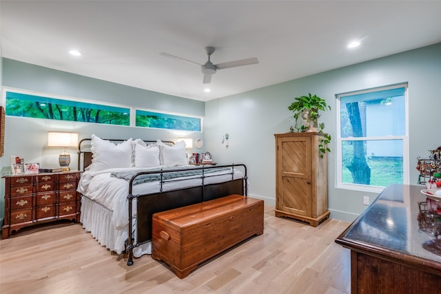 bedroom with light wood-style flooring, recessed lighting, baseboards, and ceiling fan
