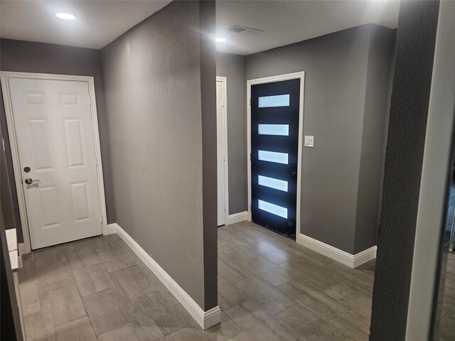 6604 Tabor St, North Richland Hills, TX 76180 - foyer entrance with wood finish floors and baseboards