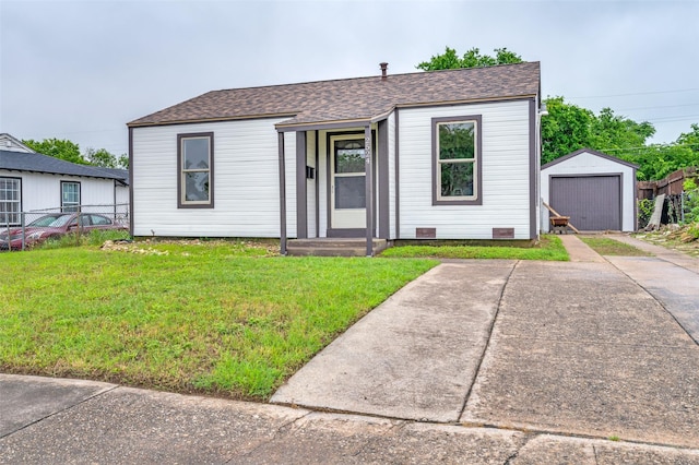 2524 Malvern Trl, Fort Worth, TX 76105 - view of front facade featuring an outbuilding, a front lawn, roof with shingles, and concrete driveway
