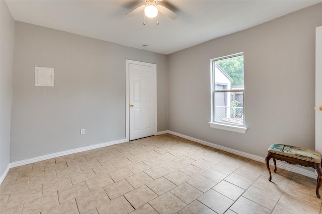 2524 Malvern Trl, Fort Worth, TX 76105 - empty room featuring ceiling fan, baseboards, and light tile patterned flooring