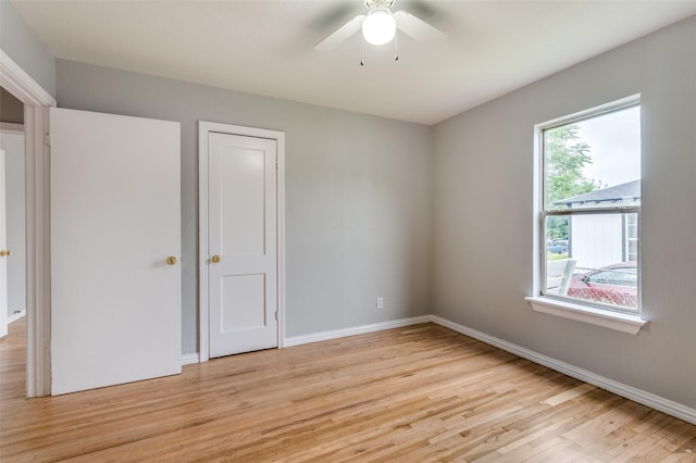 2524 Malvern Trl, Fort Worth, TX 76105 - unfurnished bedroom featuring light wood-type flooring, baseboards, and a ceiling fan