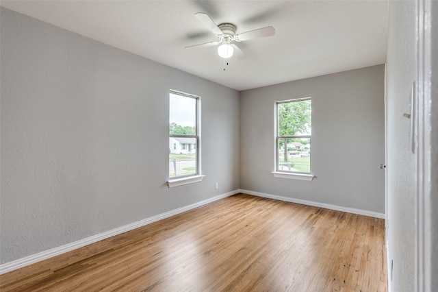 2524 Malvern Trl, Fort Worth, TX 76105 - empty room featuring light wood finished floors, baseboards, and ceiling fan
