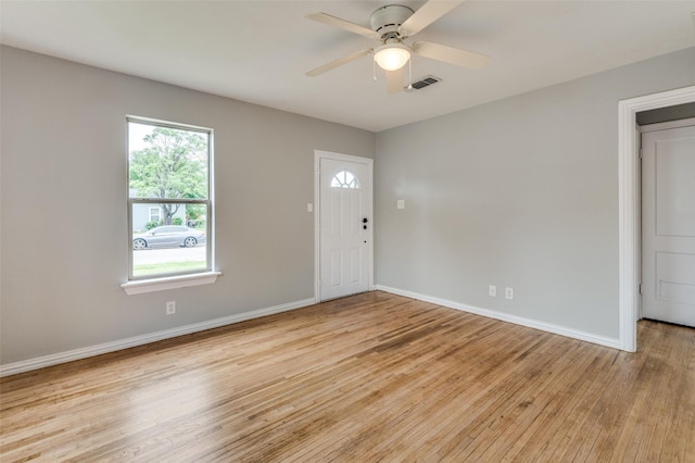 2524 Malvern Trl, Fort Worth, TX 76105 - foyer featuring light wood finished floors, ceiling fan, and baseboards