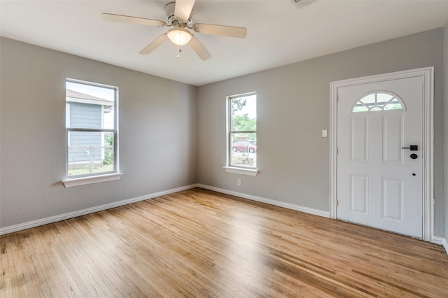 2524 Malvern Trl, Fort Worth, TX 76105 - foyer entrance with light wood-style flooring, baseboards, and a ceiling fan