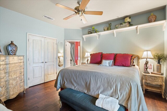 bedroom with hardwood / wood-style flooring and a ceiling fan