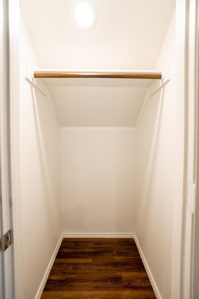 2923 Cascade Ln, Forney, TX 75126 - walk in closet with dark wood finished floors