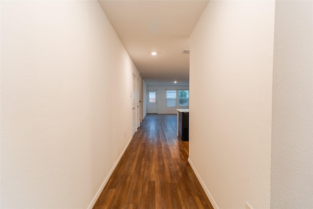 2923 Cascade Ln, Forney, TX 75126 - hall featuring dark wood-type flooring, baseboards, and recessed lighting