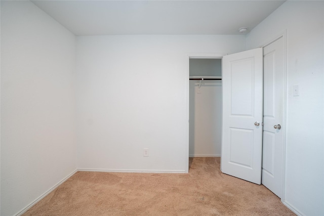 2923 Cascade Ln, Forney, TX 75126 - unfurnished bedroom with light colored carpet, baseboards, and a closet