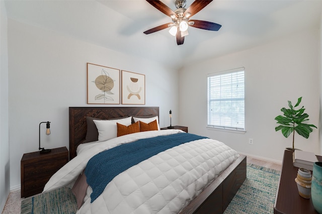 bedroom with baseboards and ceiling fan