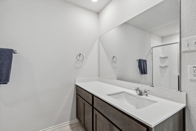 3936 Burks Ct, Celina, TX 75009 - full bathroom with vanity, a shower with shower door, and tile patterned floors
