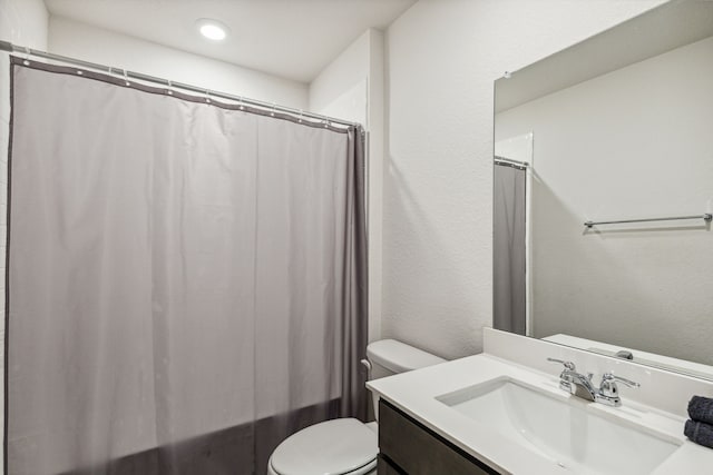 3936 Burks Ct, Celina, TX 75009 - full bathroom featuring toilet, vanity, shower / bathtub combination with curtain, and recessed lighting