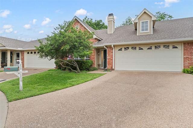 209 Village Cir, Waco, TX 76710 - view of front facade with brick siding, a garage, concrete driveway, and a shingled roof