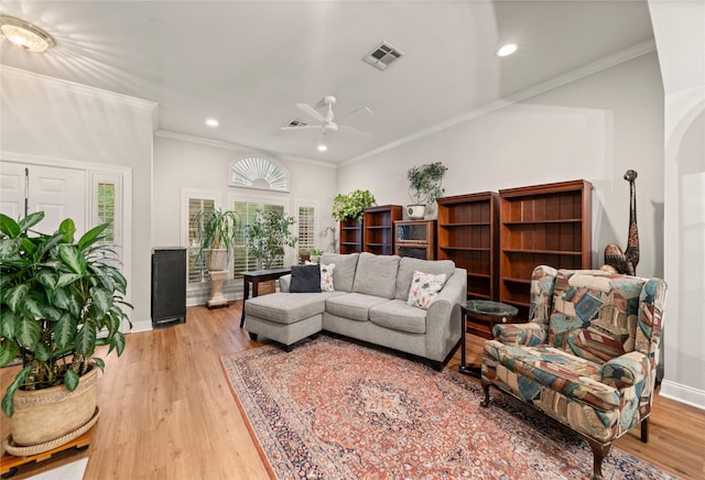 209 Village Cir, Waco, TX 76710 - living area featuring light wood finished floors, crown molding, a ceiling fan, baseboards, and recessed lighting