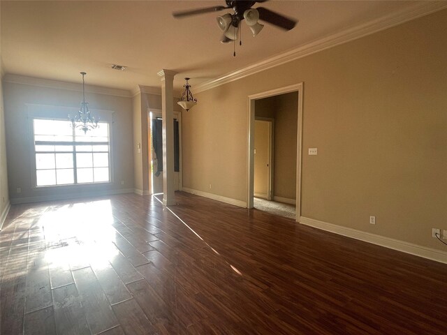 2127 Forest Hills Blvd, Haughton, LA 71037 - empty room featuring a chandelier, crown molding, ceiling fan, dark wood-style flooring, and baseboards