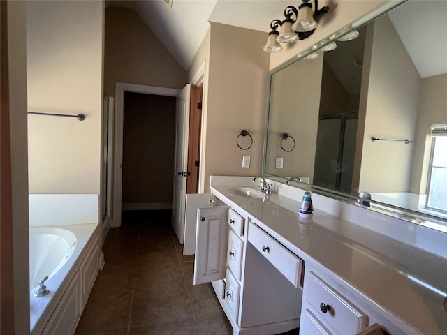 2127 Forest Hills Blvd, Haughton, LA 71037 - bathroom with vaulted ceiling, tile patterned floors, a bath, a stall shower, and vanity