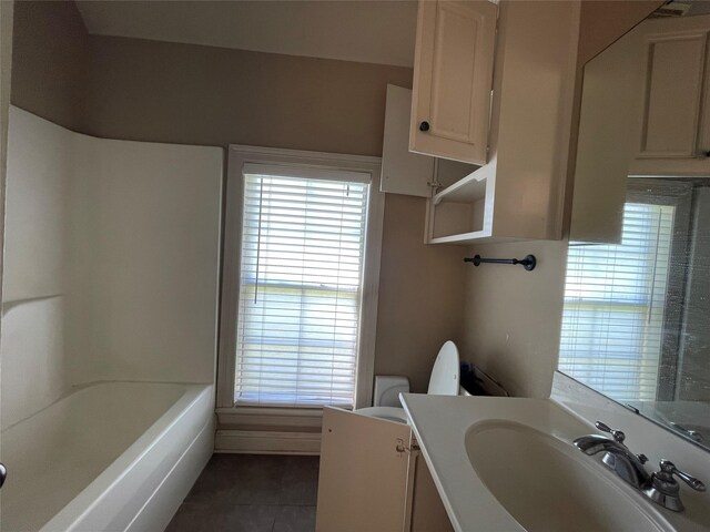 2127 Forest Hills Blvd, Haughton, LA 71037 - bathroom with tile patterned flooring, vanity, a tub, and a shower
